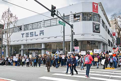 Demonstrators Protest Elon Musk Outside Bay Area Tesla Showrooms